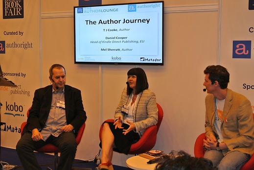 Daniel (right) at the 2013 London Book Fair with authors Mel Sherratt (middle) and TJ Cooke (left)