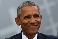 ARCHIV - 25.05.2017, Berlin: Der ehemalige US-amerikanische Präsident Barack Obama nimmt an einer Gesprächsrunde des 36. Evangelischen Kirchentages vor dem Brandenburger Tor teil. Der ehemalige US-Präsident Barack Obama befindet sich laut einem Bericht der «New York Times» in fortgeschrittenen Verhandlungen mit Netflix über eine eigene Show. (zu dpa «Bericht: Obama in Gesprächen mit Netflix über eigene Show» vom 09.03.2018) Foto: Ralf Hirschberger/dpa-Zentralbild/dpa +++ dpa-Bildfunk +++