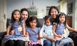 Tam Sibay, right, with her four daughters and guest Marwa.