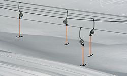 A ski lift stands still at the closed Zugspitze ski area near the  Germany's highest mountain Zugspitze (2,962 meters) near Garmisch-Partenkirchen, southern Germany, on November 30, 2020. - The Zugspitze ski area is closed during a lockdown light because of the COVID-19 pandemic. (Photo by Christof STACHE / AFP)