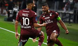 TOPSHOT - Metz's French-Moroccan midfielder Youssef Maziz (L) celebrates after scoring the second goal for his team during the French L2 football match between FC Metz and SC Bastia at Stade Saint-Symphorien in Longeville-Les-Metz, northeastern France, on June 2, 2023. (Photo by Jean-Christophe Verhaegen / AFP)