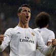 Cristiano Ronaldo of Real Madrid celebrates his goal against Borussia Dortmund during their Champions League quarter-final first leg soccer match at Santiago Bernabeu stadium in Madrid April 2, 2014.  REUTERS/Paul Hanna (SPAIN  - Tags: SPORT SOCCER)  