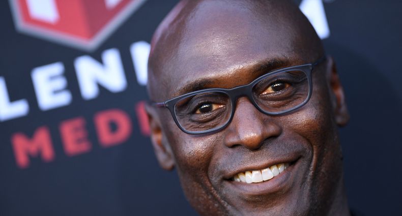 (FILES) In this file photo taken on August 20, 2019, US actor Lance Reddick arrives for the Los Angeles premiere of "Angel Has Fallen" at the Regency Village theatre in Westwood, California. - Actor Lance Reddick who played steely Baltimore police lieutenant Cedric Daniels in hit TV show "The Wire" has died, his publicist said Friday. He was 60. Reddick, who also appeared in the "John Wick" series of films opposite Keanu Reeves, was found dead at his home in the Studio City area of Los Angeles, trade title TMZ reported. (Photo by VALERIE MACON / AFP)