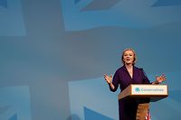 New Conservative Party leader and Britain's Prime Minister-elect Liz Truss delivers a speech at an event to announce the winner of the Conservative Party leadership contest in central London on September 5, 2022. - Truss is the UK's third female prime minister following Theresa May and Margaret Thatcher. The 47-year-old has consistently enjoyed overwhelming support over 42-year-old Sunak in polling of the estimated 200,000 Tory members who were eligible to vote. (Photo by ADRIAN DENNIS / AFP)
