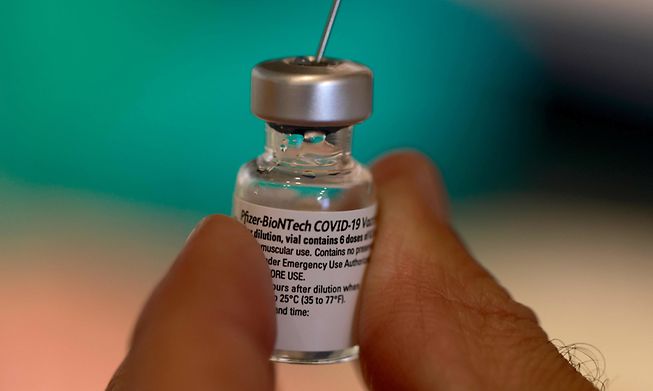 A Pfizer-BioNTech vaccine vial