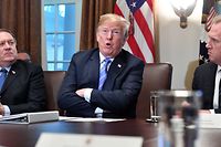 US President Donald Trump, with Secretary of State Mike Pompeo (L) and Deputy Secretary of Defense Patrick Shanahan (R), speaks during a cabinet meeting on July 18, 2018, at the White House in Washington, DC. / AFP PHOTO / Nicholas Kamm