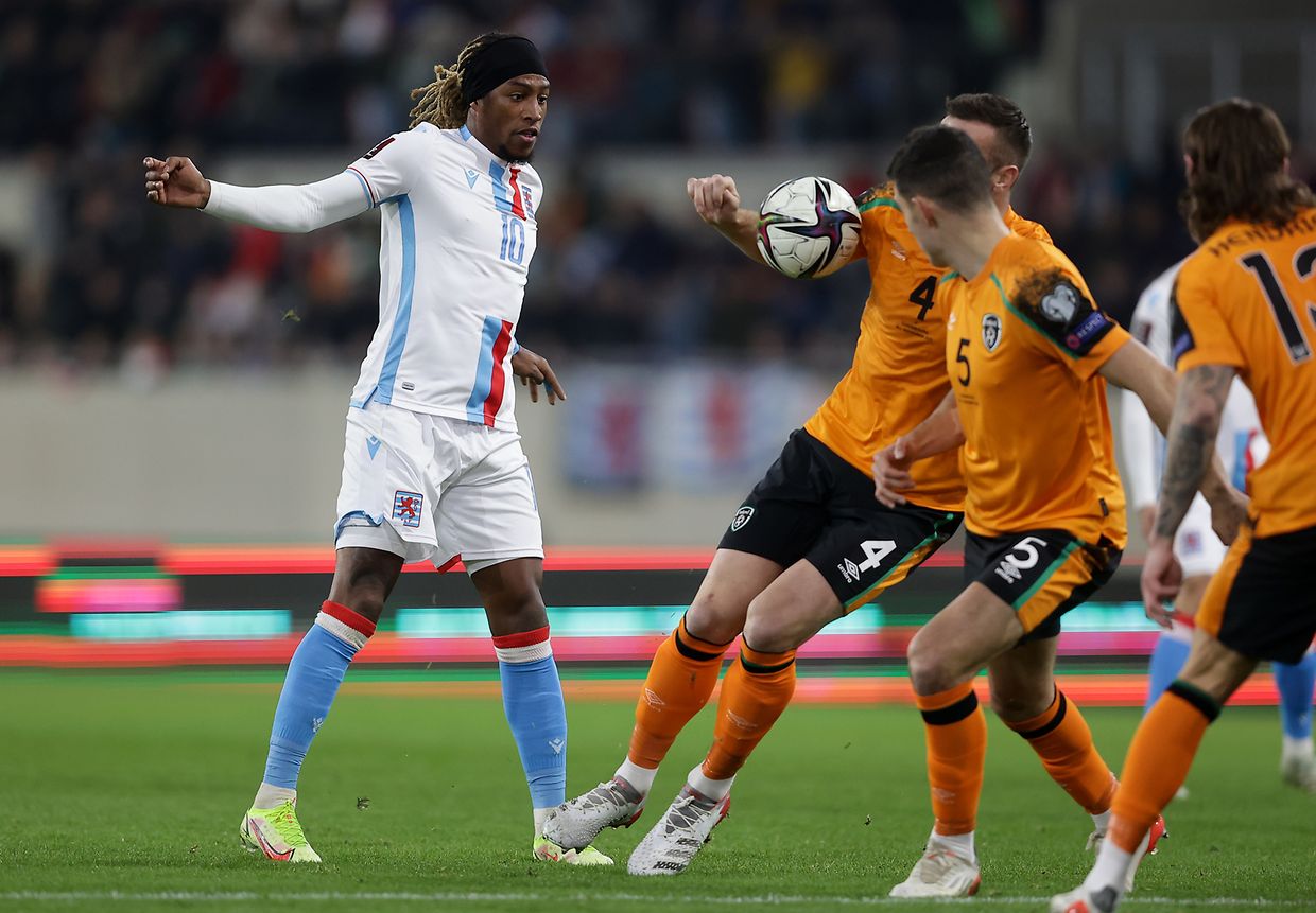 Luxembourg's Gerson Rodriguez watches as Shane snatches the ball from Duffy's hand. 