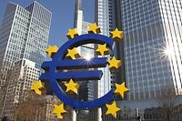 (FILES) This file photo taken on February 15, 2017 shows German artist Ottmar Hoerl's sculpture depicting the Euro logo is pictured in front of the former headquarter of the European Central Bank (ECB) in Frankfurt, western Germany
European Central Bank policymakers are expected to hint towards the exit from their easy-money policy after a gathering in Estonia on June 8, 2017, although analysts predict only inching steps in coming months.
 / AFP PHOTO / Amelie QUERFURTH