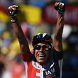 Colombia's Jarlinson Pantano celebrates as he crosses the finish line at the end of the 160 km fifteenth stage of the 103rd edition of the Tour de France cycling race on July 17, 2016 between Bourg-en-Bresse and Culoz. / AFP PHOTO / LIONEL BONAVENTURE