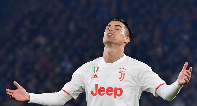 Juventus' Portuguese forward Cristiano Ronaldo reacts during the Italian Serie A football match AS Roma vs Juventus on January 12, 2020 at the Olympic stadium in Rome. (Photo by Andreas SOLARO / AFP)