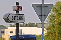 (FILES) In this file photograph taken on June 20, 2002, French gendarmes stand near a sign for the town of Bitche, Moselle Region, eastern France - The French town of Bitche celebrated its return to Facebook on April 13, 2021, three weeks after censors took down its page, believing the name to be an insult. The mayor of the northeastern town of 5,000 inhabitants, near the border with Germany, said that Facebook took down the page on March 19 on the basis that Bitche was a "violation of the conditions applying to Facebook pages". (Photo by THOMAS WIRTH / AFP)