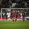 Metz's Farid Boulaya (C) is congratulated by teammates after scoring a goal during the French L1 football match between Amiens and Metz on February 29, 2020 at the Licorne Stadium in Amiens. (Photo by FRANCOIS LO PRESTI / AFP)