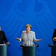 (L-R) French President Francois Hollande, German Chancellor Angela Merkel and Italy's Prime Minister Matteo Renzi address a press conference ahead of talks following the Brexit referendum at the chancellery in Berlin, on June 27, 2016.
Britain's shock decision to leave the EU forces German Chancellor Angela Merkel into the spotlight to save the bloc, but true to her reputation for prudence, she said she would act neither hastily nor nastily. / AFP PHOTO / John MACDOUGALL