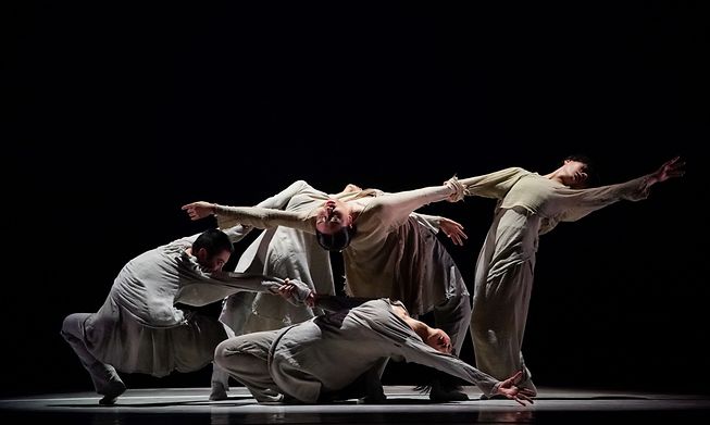 The hour-long dance performance is filled with flowing, sometimes pleasantly repetitive movements