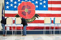 TOPSHOT - Voters cast their ballots at Robious Elementary School during the US midterm election in Midlothian, Virginia, on November 8, 2022. (Photo by Ryan M. Kelly / AFP)