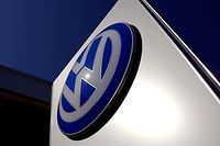 A Volkswagen logo adorns a sign outside a dealership for the German automaker located in the Sydney suburb of Artarmon, Australia, October 3, 2015.   REUTERS/David Gray/File Photo  
