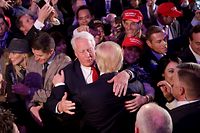 (FILES) In this file photo taken on November 9, 2016, Republican president-elect Donald Trump (front) hugs his brother Robert Trump after delivering his acceptance speech in New York City. - US President Donald Trump will visit his younger brother Robert, who is ill in hospital in New York, on August 14, 2020, the White House said. (Photo by CHIP SOMODEVILLA / GETTY IMAGES NORTH AMERICA / AFP)