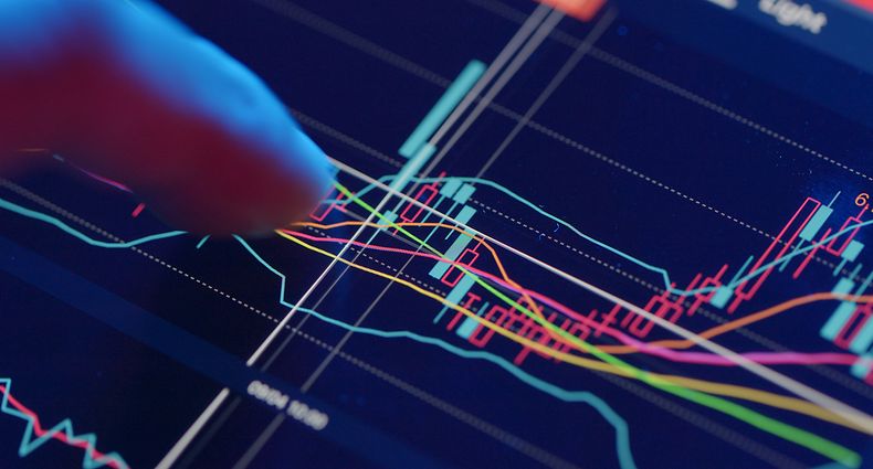 Stock market analysis on digital tablet 