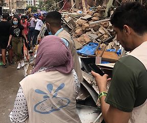 Naba'a team standing hand in hand with Beirut