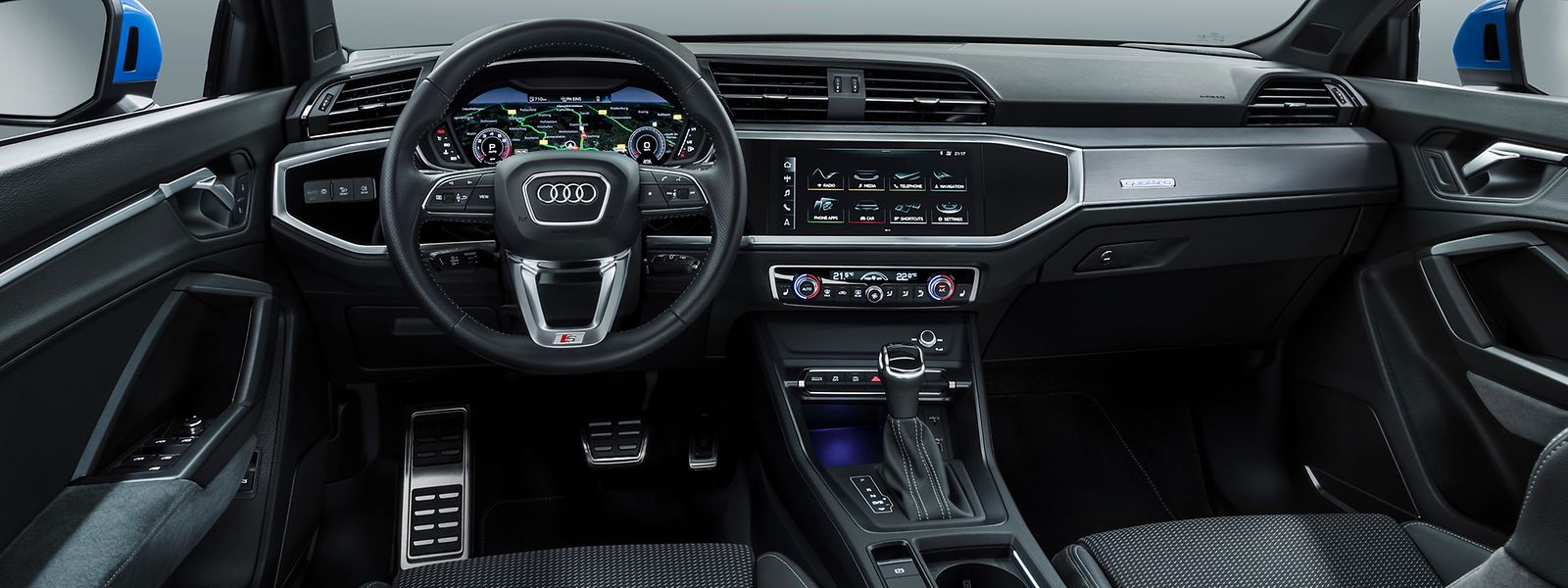  Im Cockpit des neuen Q3 spiegelt sich die Straffheit der Karosserielinie wider.