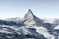 Aerial view of winter switzerland Mountains and Matterhorn landscape in sunny bright day.