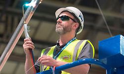 Construction work continues inside the Scottish Events Campus (SEC), which includes the SSE Hydro, in Glasgow, on April 7, 2020, as it is transformed into the NHS Louisa Jordan hospital to help with the novel coronavirus COVID-19 pandemic. - Britain on Tuesday reported a record 786 new COVID-19 deaths in its daily update, following two days of falling figures. "As of 5pm on 6 April, of those hospitalised in the UK who tested positive for coronavirus, 6,159 have sadly died," the health ministry tweeted, up from 5,373 on Monday. (Photo by Ian Rutherford / POOL / AFP)