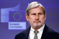 EU commissioner for Budget and Administration Johannes Hahn speaks during a press conference on Hungary�s recovery and resilience plan and on the application of the Rule of Law conditionality regulation at EU headquarters in Brussels, on November 30, 2022. - The European Commission recommended 13 billion euros ($13 billion) in EU funds for Hungary be frozen because Budapest is falling short on its commitments to meeting European rule of law. (Photo by Kenzo TRIBOUILLARD / AFP)