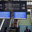 A screen displays information regarding suspended Eurostar traffic near the "Hall London" at Gare du Nord international railway station in Paris on January 17, 2015, after smoke was detected in the Channel Tunnel. Traffic was suspended in both directions in the Channel Tunnel between Britain and France on January 17 after a lorry fire, authorities said. AFP PHOTO / LIONEL BONAVENTURE