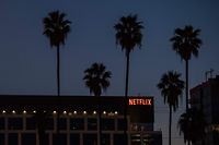 (FILES) In this file photo taken on February 04, 2021, the Netflix logo sign is seen on top of it's office building in Hollywood, California. - Netflix reported on July 19, 2022, losing subscribers for the second quarter in a row as the streaming giant battles fierce competition and plateauing demand. (Photo by VALERIE MACON / AFP)