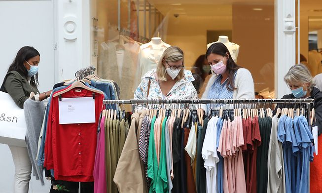 Shoppers in Luxembourg City wear masks to protect each other from possible Covid-19 transmission 