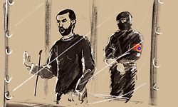 A courtroom sketch made on December 5, 2022 at the Justitia building in Brussels, shows defendant Mohamed Abrini (L) speaking from the defendants glass box in the courtroom during the trial of alleged jihadists, accused of directing or aiding suicide bombings in Brussels' metro and airport, on March 22, 2016. - Both the November 13, 2015 Paris attacks and the March 22, 2016 suicide bombings in Brussels were claimed by the Islamic State group, and investigators believe they were carried out by the same Belgium-based cell. Five of the nine defendants to appear in the dock in Belgium have already been convicted in the French trial, including Abdeslam. Hundreds of witnesses and victims will testify in the months to come, some still hopeful that telling the story of Belgium's worst peacetime massacre will offer them a measure of closure. (Photo by JONATHAN DE CESARE / BELGA / AFP) / Belgium OUT
