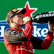 Ferrari's Monegasque driver Charles Leclerc celebrates his victory at the podium after the 2022 Formula One Australian Grand Prix at the Albert Park Circuit in Melbourne on April 10, 2022. (Photo by Con Chronis / AFP) / -- IMAGE RESTRICTED TO EDITORIAL USE - STRICTLY NO COMMERCIAL USE --