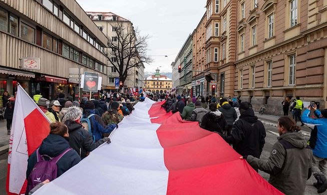 Protestors take part in a demonstration against the Austrian government's Covid-19 measures in Innsbruck at the weekend
