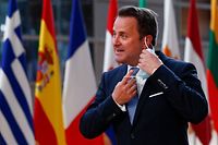 Prime Minister of Luxembourg Xavier Bettel speaks the press as he arrives to attend the second day of the EU summit at the European Council building in Brussels on May 25, 2021. - European Union leaders take part in a two day in-person meeting to discuss the coronavirus pandemic, climate and Russia. (Photo by JOHANNA GERON / POOL / AFP)