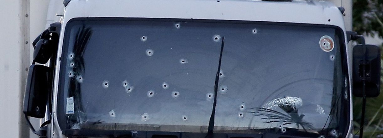 Bullet imacts are seen on the heavy truck that ran into a crowd at high speed killing scores celebrating the Bastille Day July 14 national holiday on the Promenade des Anglais killing 80 people in Nice, France, July 15, 2016.    REUTERS/Eric Gaillard  