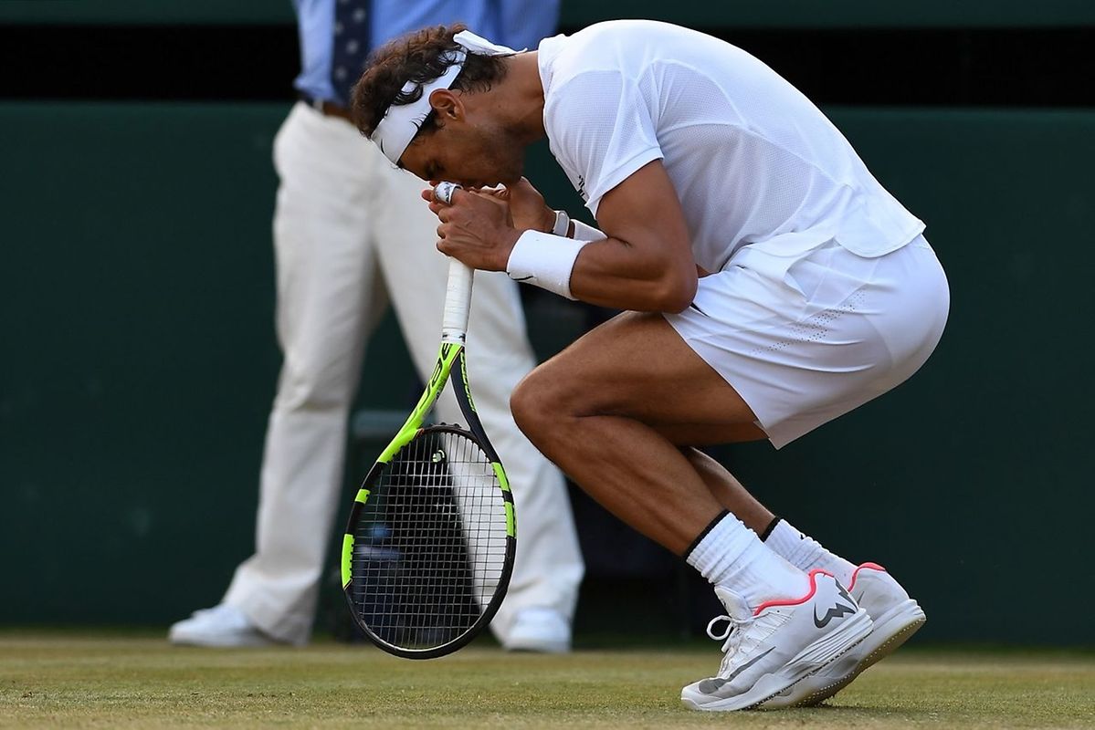 Spain's Rafael Nadal reacts against Luxembourg's Gilles Muller in the fifth set tie-break of their men's singles fourth round match on the seventh day of the 2017 Wimbledon Championships at The All England Lawn Tennis Club in Wimbledon, southwest London, on July 10, 2017. / AFP PHOTO / Glyn KIRK / RESTRICTED TO EDITORIAL USE