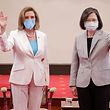 This handout taken and released by Taiwan's Presidential Office on August 3, 2022 shows US House Speaker Nancy Pelosi (L) waving beside Taiwan's President Tsai Ing-wen at the Presidential Office in Taipei. (Photo by Handout / Taiwan Presidential Office / AFP) / -----EDITORS NOTE --- RESTRICTED TO EDITORIAL USE - MANDATORY CREDIT "AFP PHOTO / TAIWAN'S PRESIDENTIAL OFFICE " - NO MARKETING - NO ADVERTISING CAMPAIGNS - DISTRIBUTED AS A SERVICE TO CLIENTS