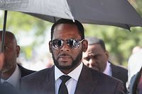 (FILES) In this file photo taken on June 26, 2019 singer R. Kelly leaves the Leighton Criminal Courts Building following a hearing on June 26, 2019 in Chicago, Illinois. - Disgraced R&B singer R. Kelly, who is serving a 30-year sentence for sex offenses, was found guilty of child pornography charges on September 14, 2022 after a month-long trial in his hometown of Chicago. Kelly, whose full name is Robert Sylvester Kelly, was convicted of three counts of producing child pornography and three counts of enticement of a minor, the Chicago Tribune reported. (Photo by SCOTT OLSON / GETTY IMAGES NORTH AMERICA / AFP)