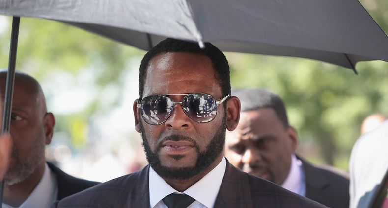 (FILES) In this file photo taken on June 26, 2019 singer R. Kelly leaves the Leighton Criminal Courts Building following a hearing on June 26, 2019 in Chicago, Illinois. - Disgraced R&B singer R. Kelly, who is serving a 30-year sentence for sex offenses, was found guilty of child pornography charges on September 14, 2022 after a month-long trial in his hometown of Chicago. Kelly, whose full name is Robert Sylvester Kelly, was convicted of three counts of producing child pornography and three counts of enticement of a minor, the Chicago Tribune reported. (Photo by SCOTT OLSON / GETTY IMAGES NORTH AMERICA / AFP)
