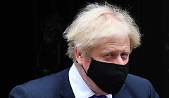 Britain's Prime Minister Boris Johnson wearing a face mask because of the coronavirus pandemic leaves number 10 Downing Street in central London on December 2, 2020, to take part in the Prime Minister Question (PMQs) session in the House of Commons. - Britain's Prime Minister Boris Johnson on Wednesday hailed UK approval for the use of Pfizer-BioNTech's Covid-19 vaccine as "fantastic" news that would help life get back to normal. "It's the protection of vaccines that will ultimately allow us to reclaim our lives and get the economy moving again," he said, after regulators gave the green light in a world first. (Photo by JUSTIN TALLIS / AFP)
