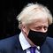 Britain's Prime Minister Boris Johnson wearing a face mask because of the coronavirus pandemic leaves number 10 Downing Street in central London on December 2, 2020, to take part in the Prime Minister Question (PMQs) session in the House of Commons. - Britain's Prime Minister Boris Johnson on Wednesday hailed UK approval for the use of Pfizer-BioNTech's Covid-19 vaccine as "fantastic" news that would help life get back to normal. "It's the protection of vaccines that will ultimately allow us to reclaim our lives and get the economy moving again," he said, after regulators gave the green light in a world first. (Photo by JUSTIN TALLIS / AFP)