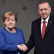 Turkish President Recep Tayyip Erdogan (R) and German Chancellor Angela Merkel (L) shake hands after a joint news conference on January 24, 2020 in Istanbul. (Photo by Ozan KOSE / AFP)