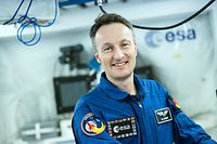 25 September 2018, North Rhine-Westphalia, Cologne: Matthias Maurer, ESA astronaut, stands in a model of the Columbus module of the International Space Station ISS. Maurer has completed his basic training and receives his certificate. He was the second German after Alexander Gerst to join the team of Esa astronauts. Photo: Federico Gambarini/dpa (Photo by Federico Gambarini/picture alliance via Getty Images)