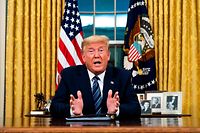 US President Donald Trump addresses the Nation from the Oval Office about the widening novel coronavirus (Covid-19) crisis in Washington, DC on March 11, 2020. - President Donald Trump announced on March 11, 2020 the United States would ban all travel from Europe for 30 days starting to stop the spread of the coronavirus outbreak. "To keep new cases from entering our shores, we will be suspending all travel from Europe to the United States for the next 30 days. The new rules will go into effect Friday at midnight," Trump said in an address to the nation. (Photo by Doug Mills / POOL / AFP)