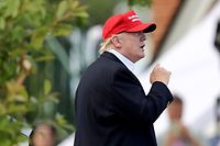 (FILES) In this file photo US President Donald Trump waves as he leaves the U.S. Women's Open round three on July 15, 2017 at Trump National Golf Club in Bedminster, New Jersey. - As much as President Donald Trump loves golf, leaders of the sport are racing away from the embattled US leader for what they say is the good of the game.
The PGA of America stripped the 2022 PGA Championship from Trump National at Bedminster, New Jersey, on January 10, days after Trump supporters attacked the US Capitol. (Photo by ELSA / GETTY IMAGES NORTH AMERICA / AFP)