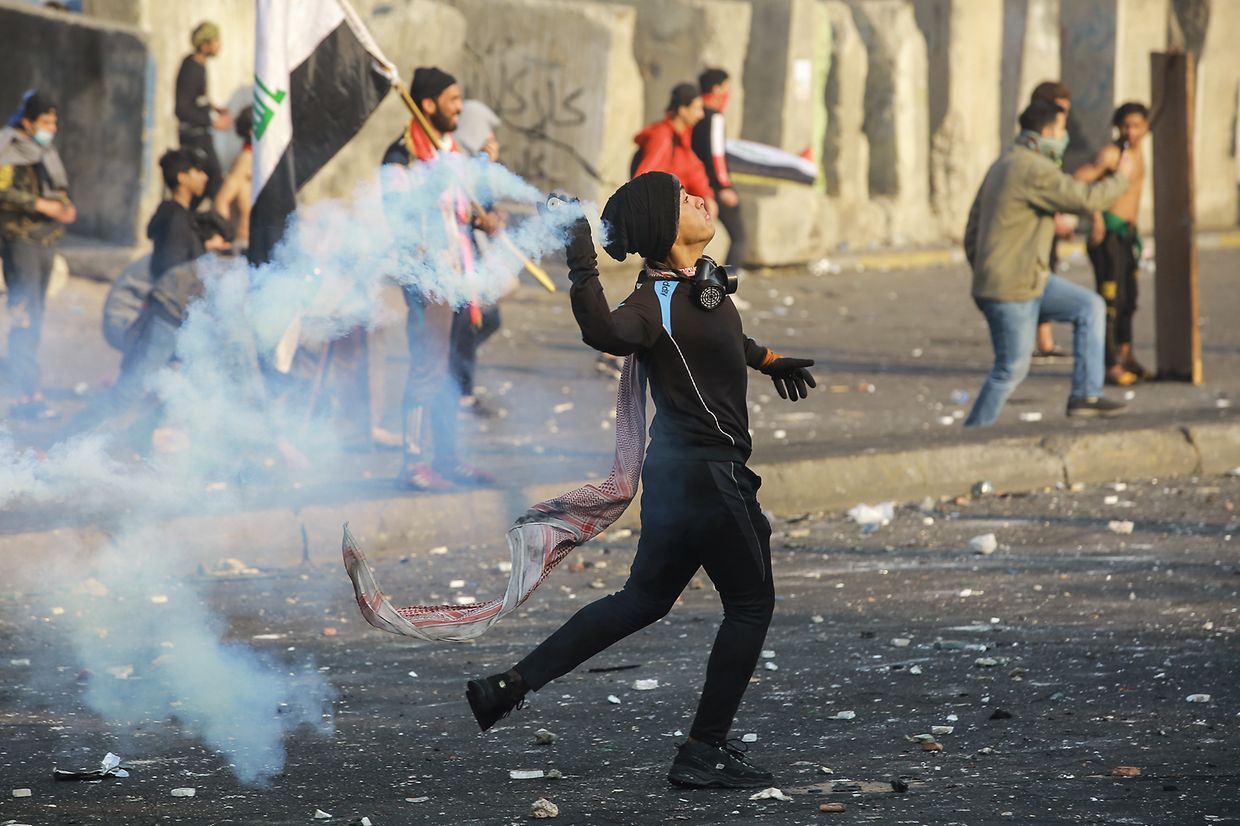 Regierungskritische Demonstranten bei Straßenkämpfen in Baghdad.