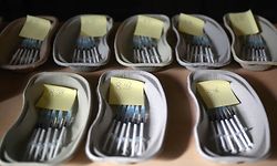Trays with syringes filled with the AstraZeneca vaccine against COVID-19 lay ready for use at the St Antonius Church in Castrop-Rauxel, western Germany on May 19, 2021. - For Corona vaccinations, a GP in Castrop-Rauxel is using a Catholic church near his practice, as his group practice is too small for the rush of patients. (Photo by Ina FASSBENDER / AFP)