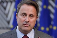 Luxembourg's Prime Minister Xavier Bettel addresses media representatives on the first day of a European Union (EU) summit at The European Council Building in Brussels on October 21, 2021, as EU leaders discuss Covid-19, digital transformation, energy prices, migration, trade and external relations. (Photo by POOL / AFP)