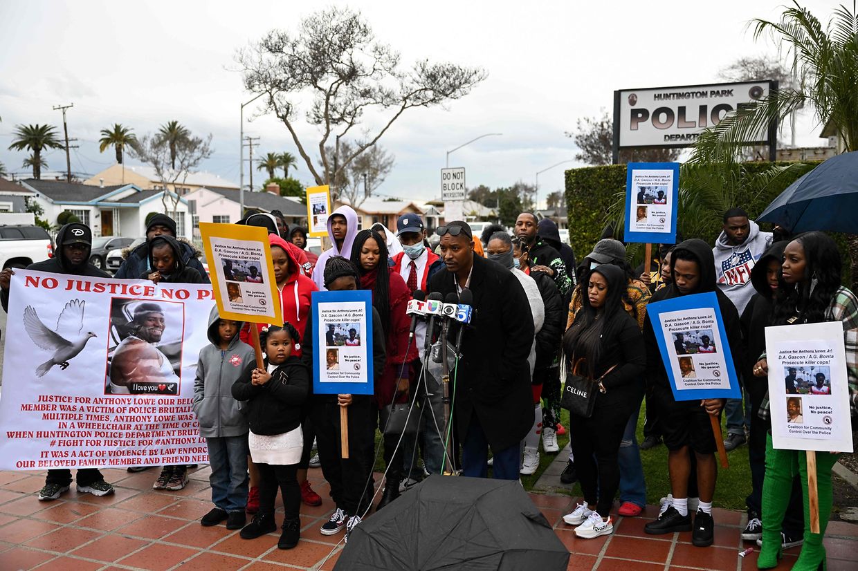 Family and friends of Anthony Lowe Jr hold a news conference to demand an investigation into his death outside of the Huntington Park Police Department in Huntington Park, California, on January 30, 2023. - Lowe was reportedly in a wheelchair with both legs amputated at the knees and undergoing a mental health crisis when he was shot to death by Huntington Park police on January 26, 2023. (Photo by Patrick T. FALLON / AFP)