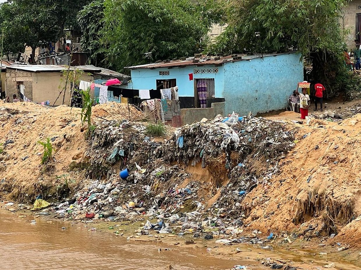 Torrential rains and floods swept away nearly 300 homes, and carried away tons of waste that contaminates the water.